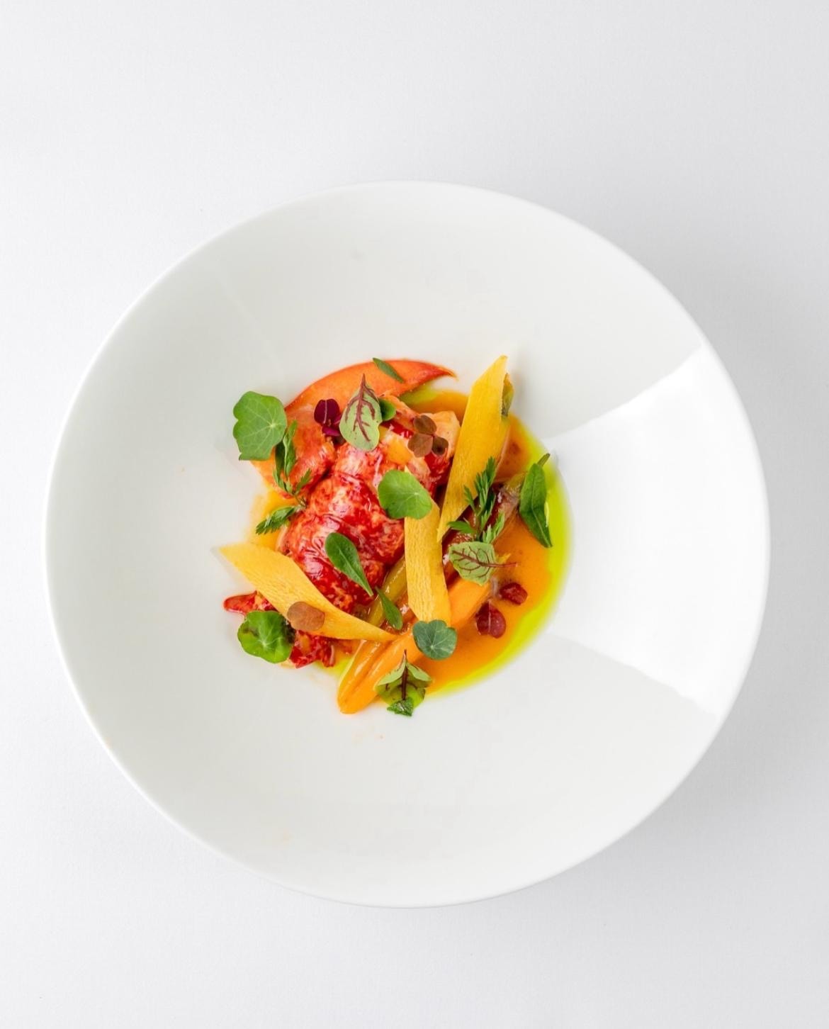 Fine dining lobster dish overhead