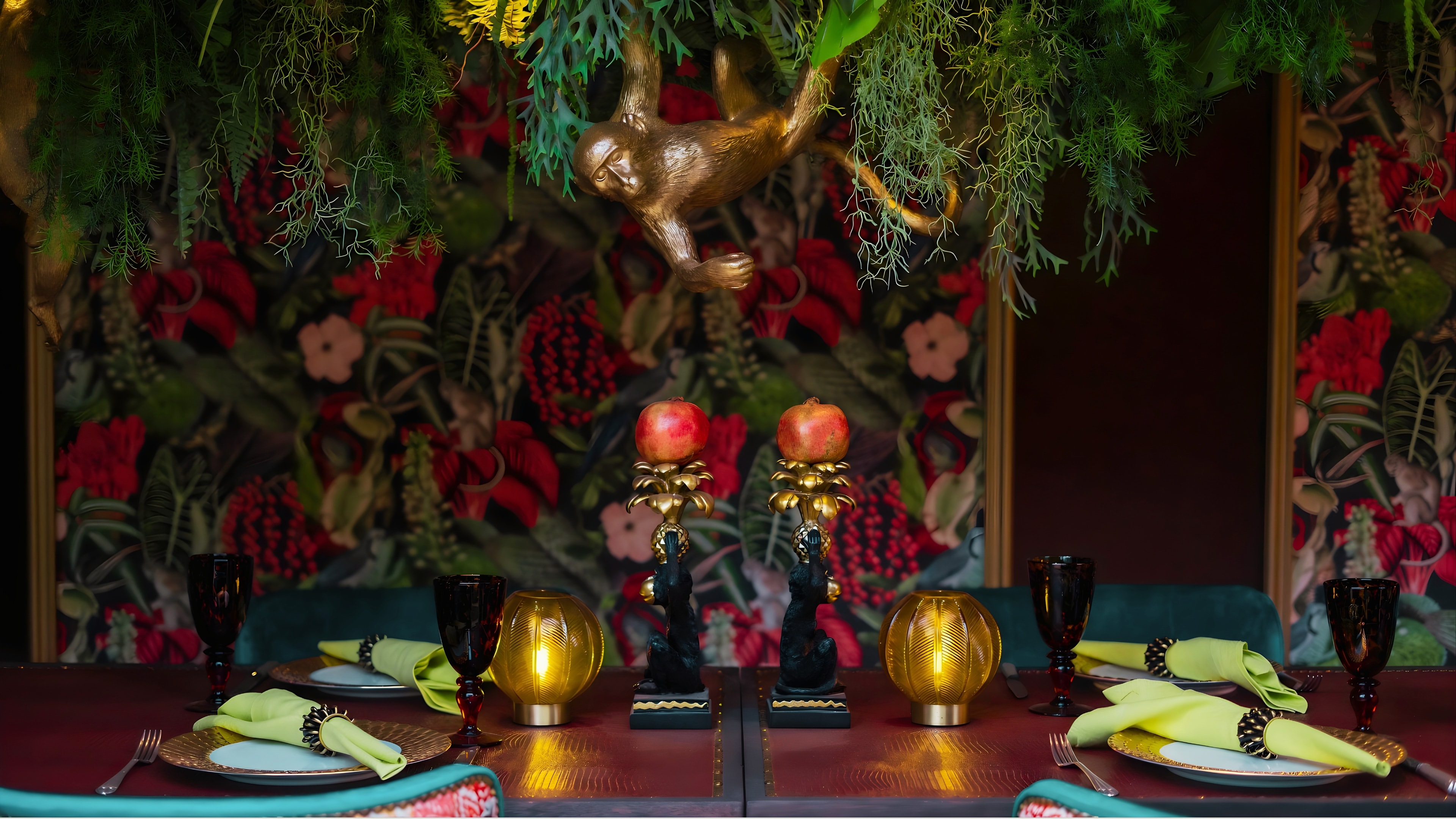 Elegantly styled private dining table with botanical décor and gold accents